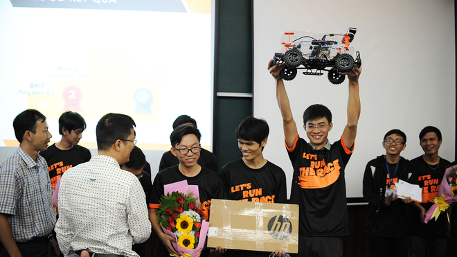 A group of young men holding a toy car above their head

AI-generated content may be incorrect.