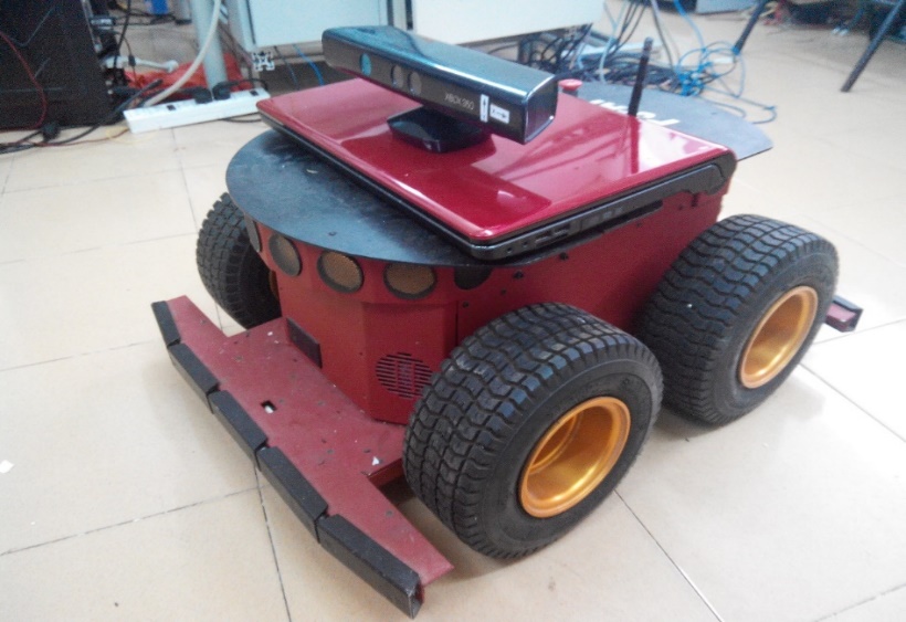 A red robot with black wheels

AI-generated content may be incorrect.