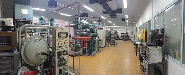 A room with machines and equipment AI-generated content may be incorrect.