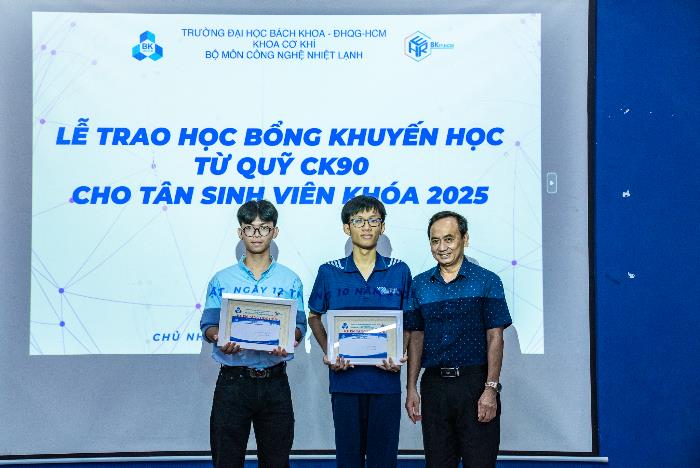 A group of men standing in front of a large screen

AI-generated content may be incorrect.