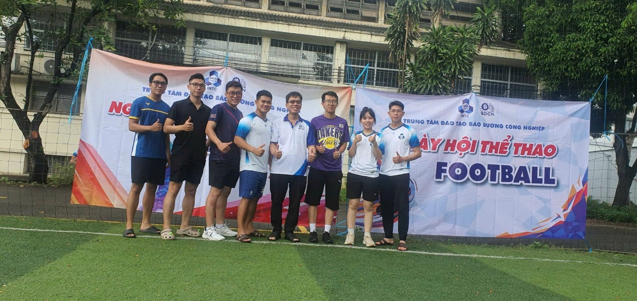 A group of people standing on a field