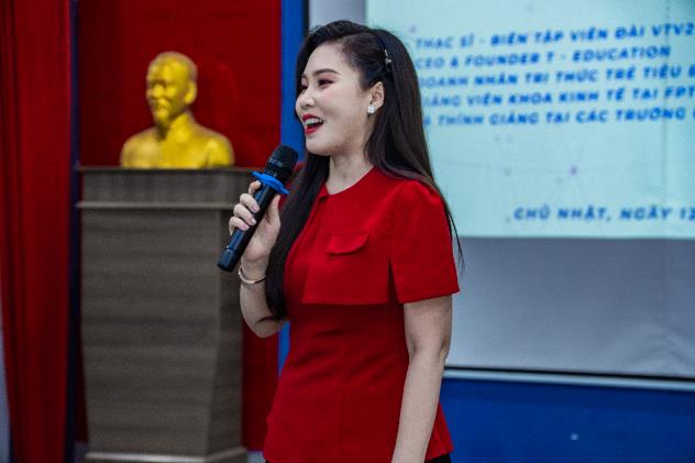 A person in a red dress holding a microphone

AI-generated content may be incorrect.